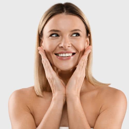 Beautiful woman touching her face promoting the benefits of PDO Thread Lift available in Rancho Cucamonga, Hesperia, and Redlands, California